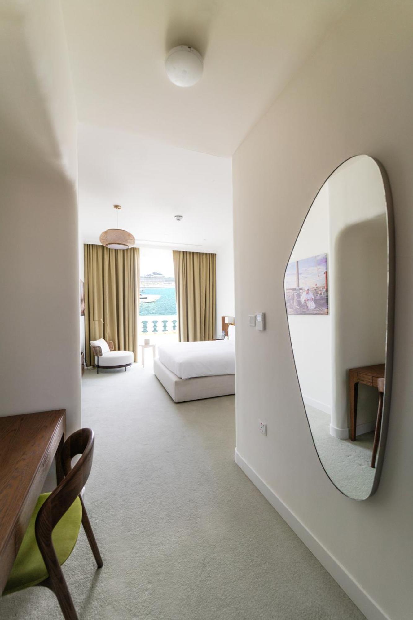 Mina Hotel And Residences By The Torch Ντόχα Εξωτερικό φωτογραφία A bedroom at the hotel