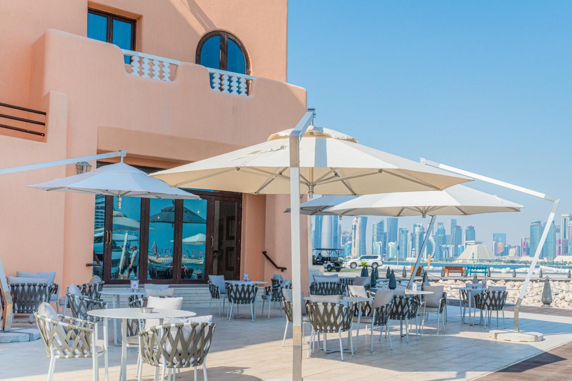 Mina Hotel And Residences By The Torch Ντόχα Εξωτερικό φωτογραφία A patio umbrella
