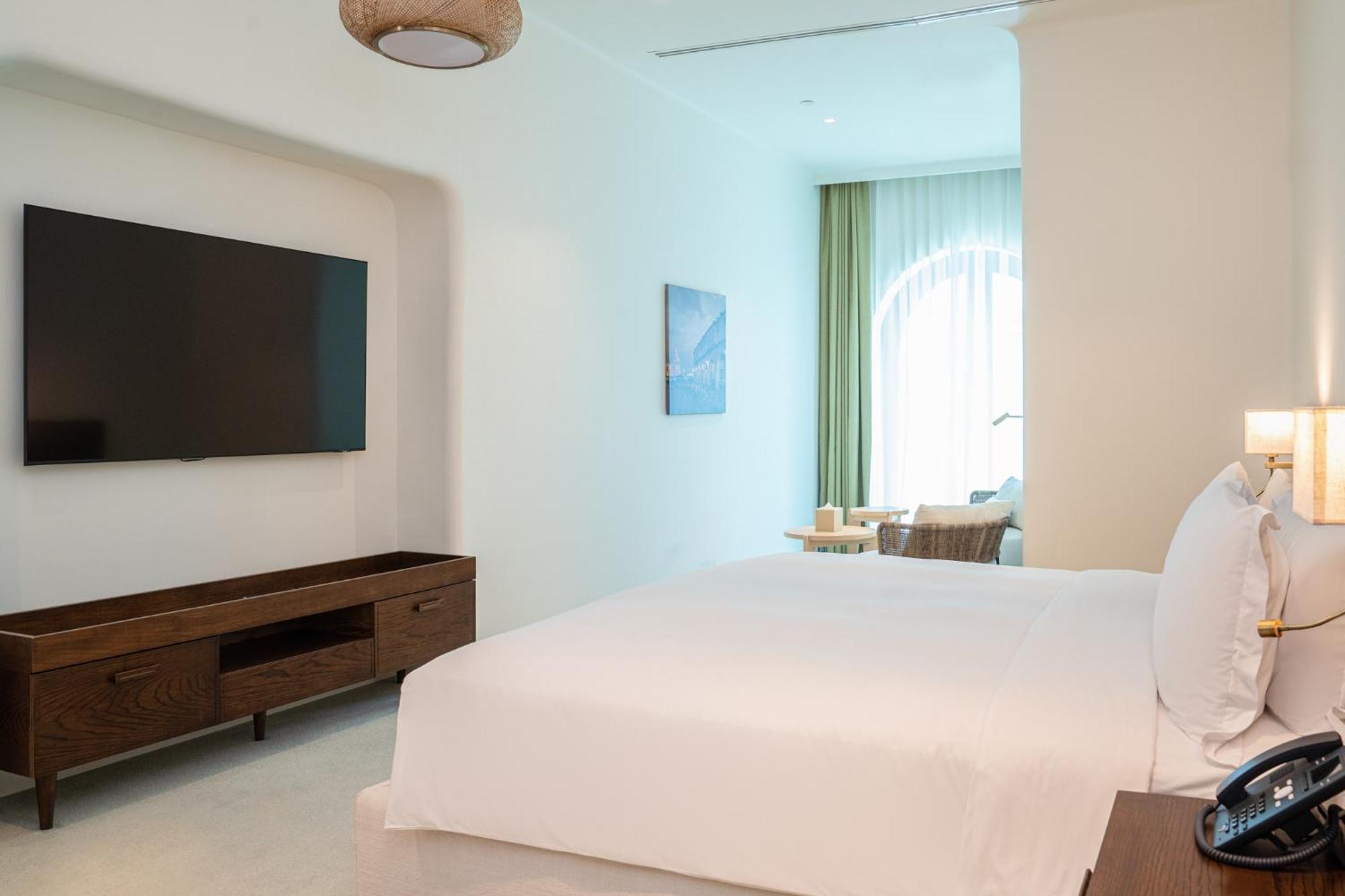 Mina Hotel And Residences By The Torch Ντόχα Εξωτερικό φωτογραφία A bedroom at the hotel