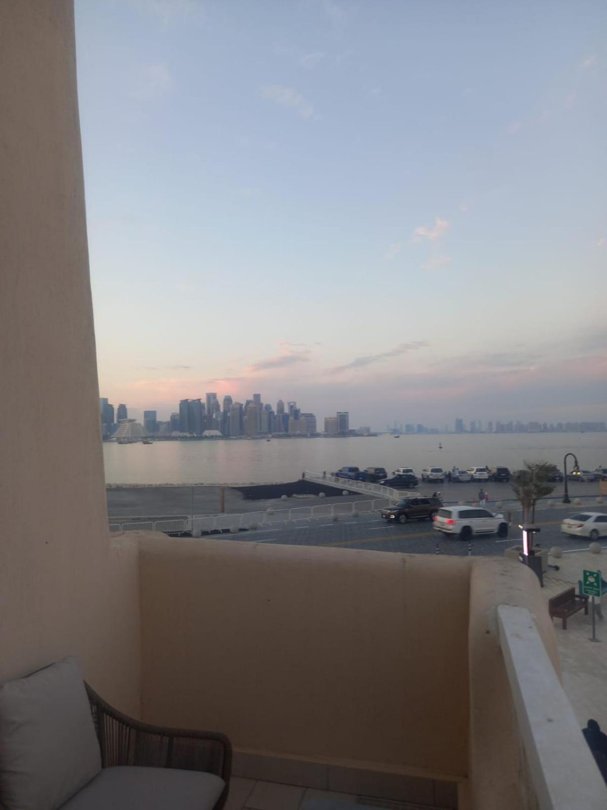 Mina Hotel And Residences By The Torch Ντόχα Εξωτερικό φωτογραφία View of Manama skyline from a residential area in Saar